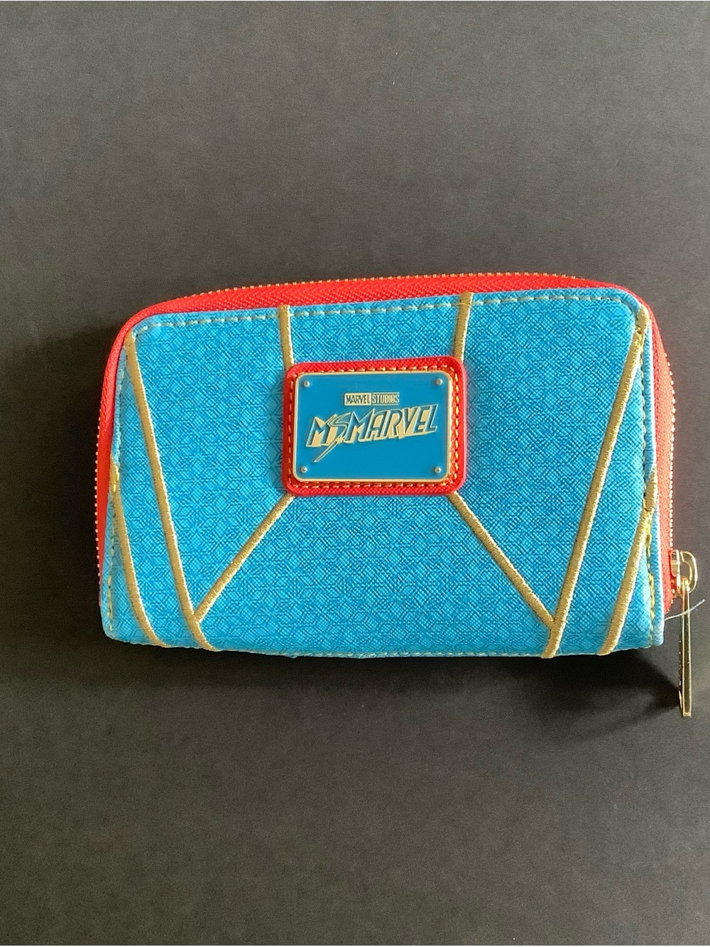 Marvel MsMarvel Turquoise wallet with red trim and gold accents